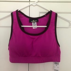 Pink Sports Bra with brown/Maroon piping. Vented back. Size missy small